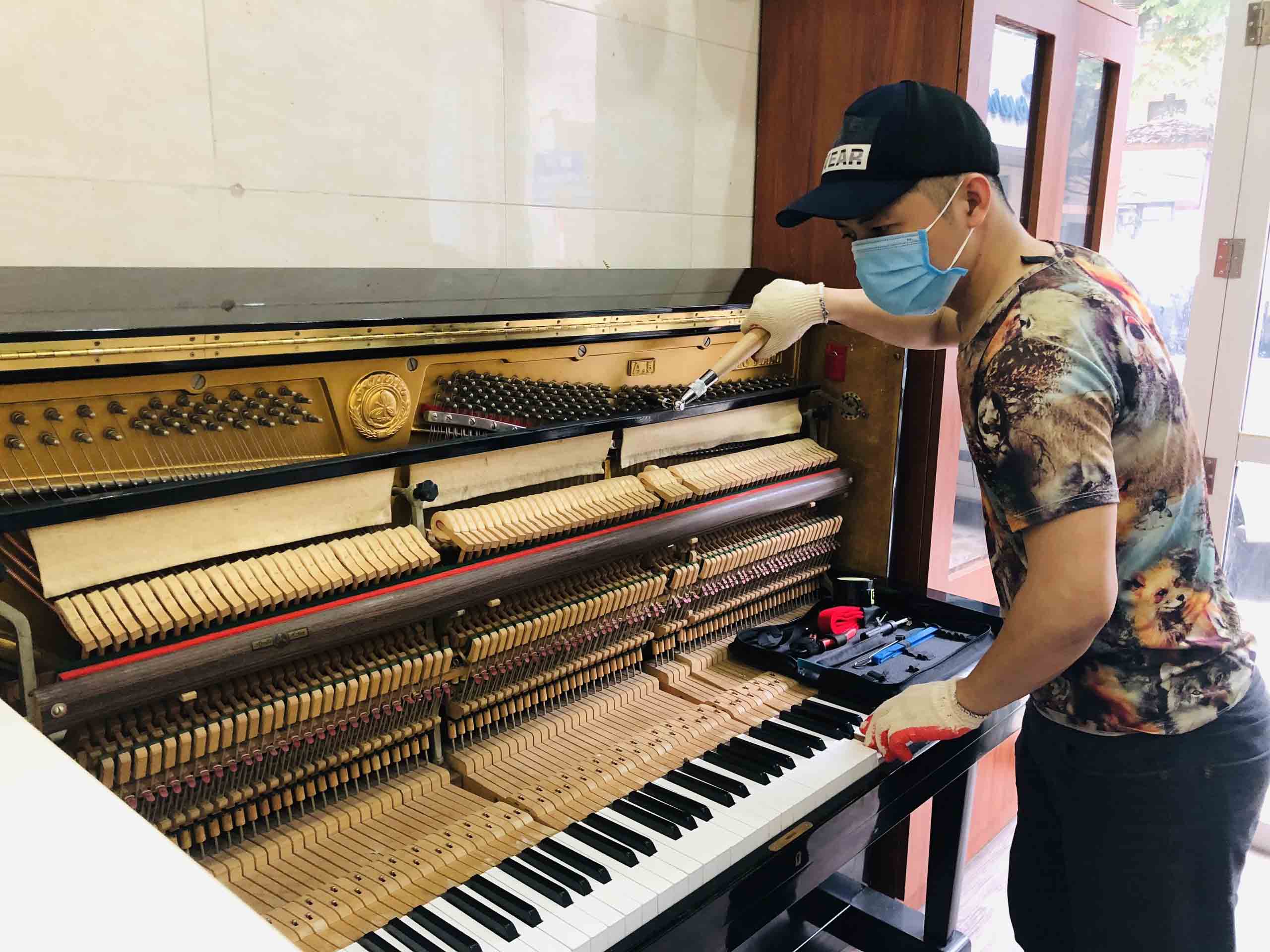 dịch vụ lên dây đàn piano cơ hải dương